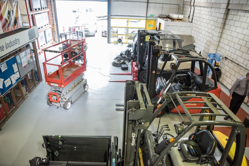 Forklift trucks in workshop